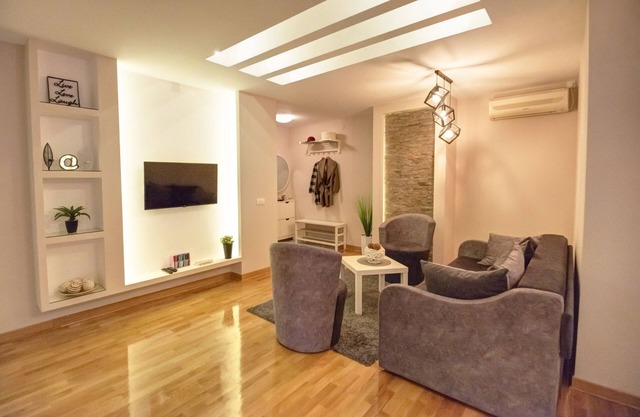 Living is easy in this impressive, one of akind condo located in bohemic street
