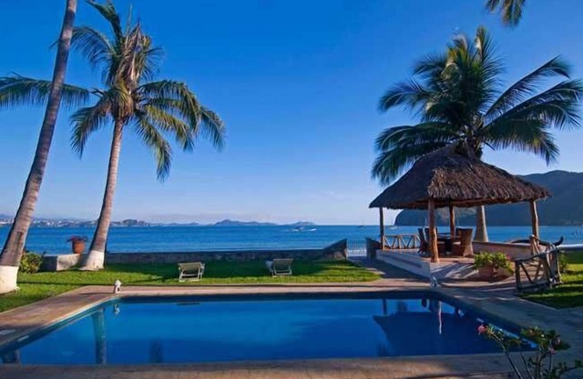 Location, location.......4 Bedroom right on beautiful sandy beach