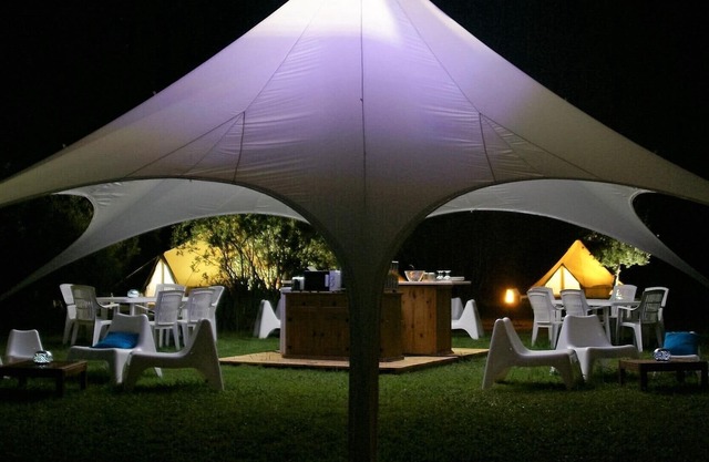 Lodge tents by the sea