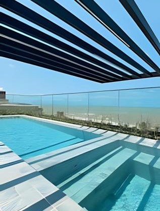 Loft luxo p/4 pessoas, a 50m do mar