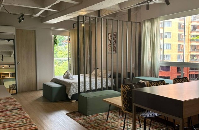 Loft-Style apartment with A/C. Close to shopping, dining, bars, and nightlife.