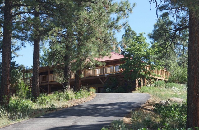 Log Cabin with a Mountain View. Secluded property with easy access to amenities