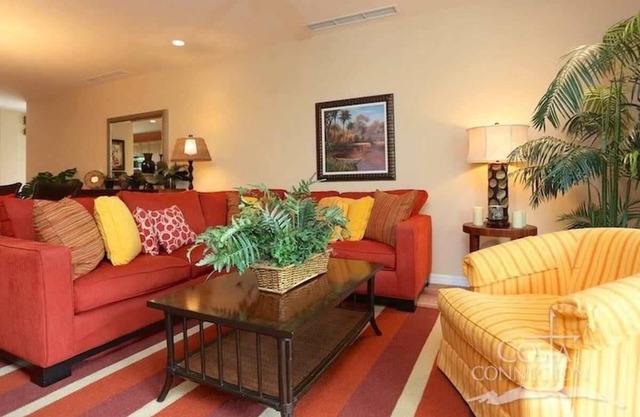 Luxe! Impressively designed 2nd-floor unit in Coco done in red and orange hues