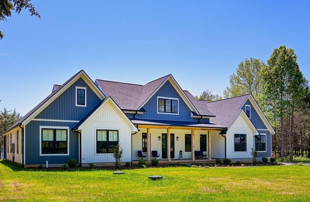 Luxurious lakeside home with private dock, beach, patio, & game room - dogs OK