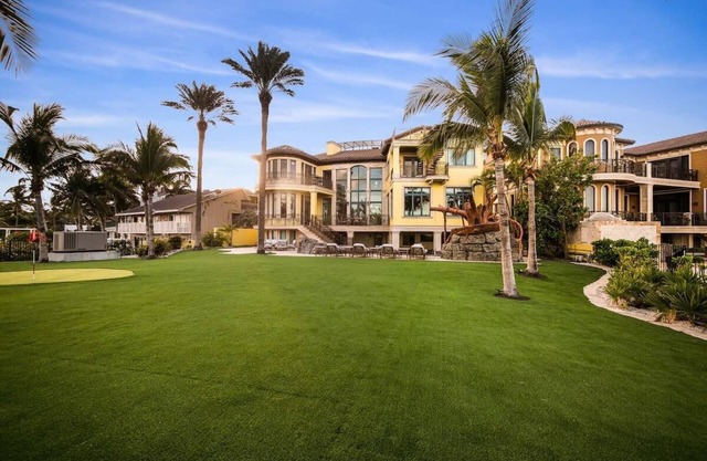 Luxurious Oceanfront Estate 5 Bedroom along the Hillsboro Inlet with Private Bea
