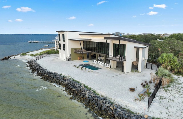 Luxury Waterfront 6 Bedroom. 6.5 Bath Home with Private Pool!