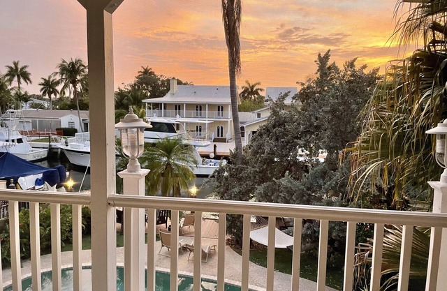 Luxury WATERFRONT Estate! Golfcart, STEAM SHOWER, heat pool, steps to the beach!