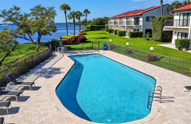 Magical sunset views from newly redone waterfront Palm Beach townhome.