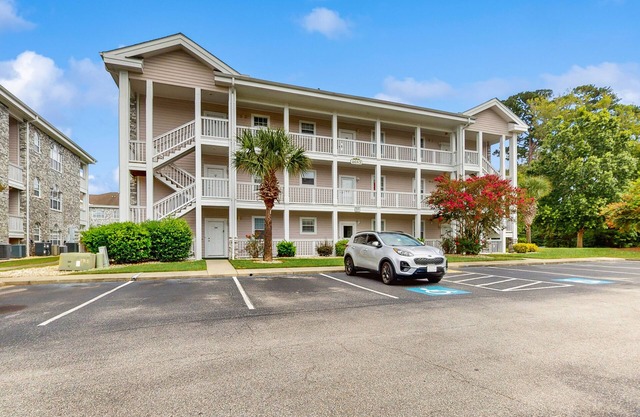 Magnolia Place condo located on the top floor with balcony views