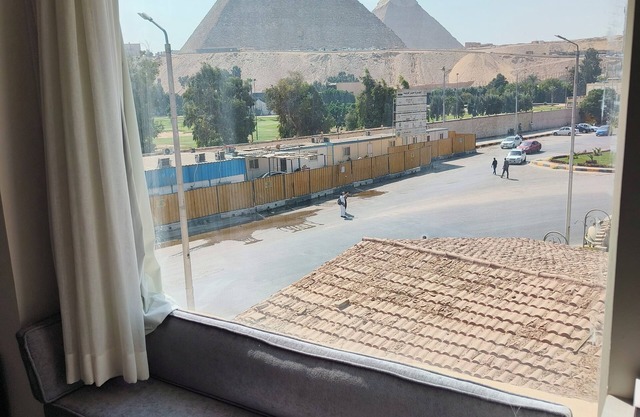 Maria Pyramids House
