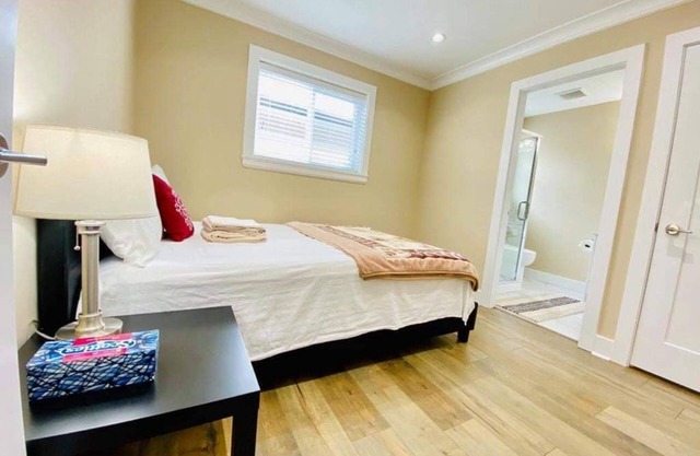 Master bedroom with private bathroom in New home