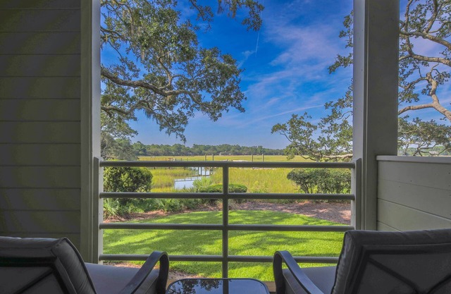 Mesmerizing Marsh Views, Multiple Decks, Community Pool & Dock, Amenity Card Access, Easy Location!