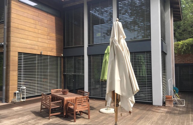Minimalistic family house on the edge of the woods but 15 min from the city