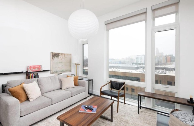 Modern 1BR Apt with Skywalk to Fiserv, Rooftop, and Parking