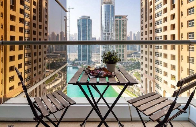 Modern 1BR in JLT w/ Serene Lake Views!