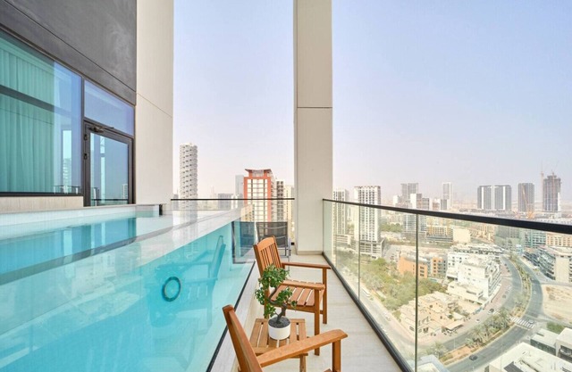 Modern 2BR Retreat in JVC w/Private Pool Balcony
