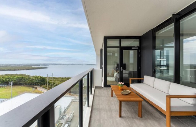 Modern 2BR with Balcony, Pool & Parking