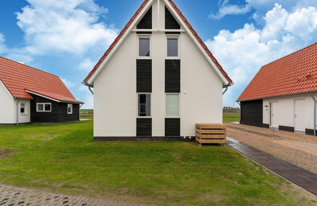 Modern holiday home by the sea with sauna