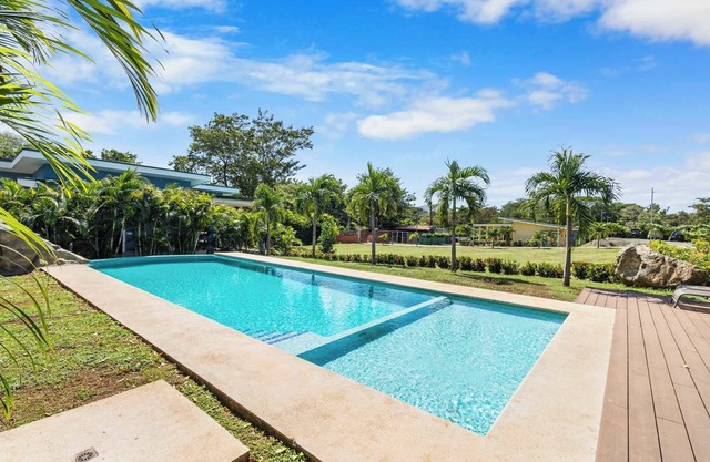 Modern Home with Lush Mountain Views and Spectacular Shaded Terrace in Private G