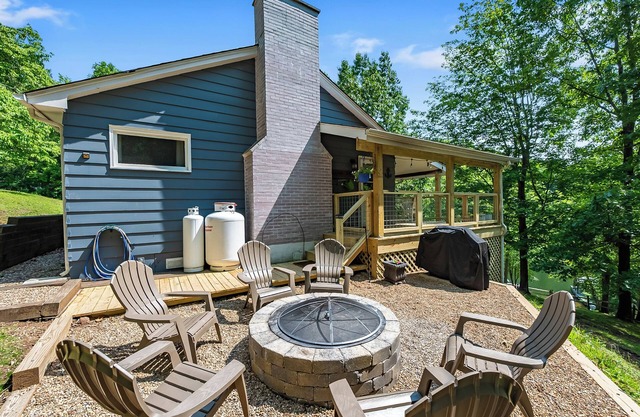 Modern lakefront home with dock, deck, and direct Claytor Lake access for swimming and fishing!