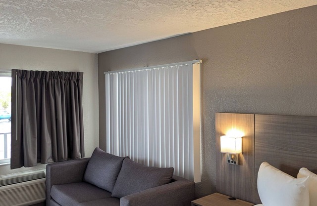 Modern one-room apartment with updated amenities, including a full kitchen.