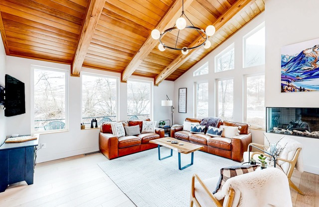 Modern townhouse with private hot tub, mountain views, & natural light