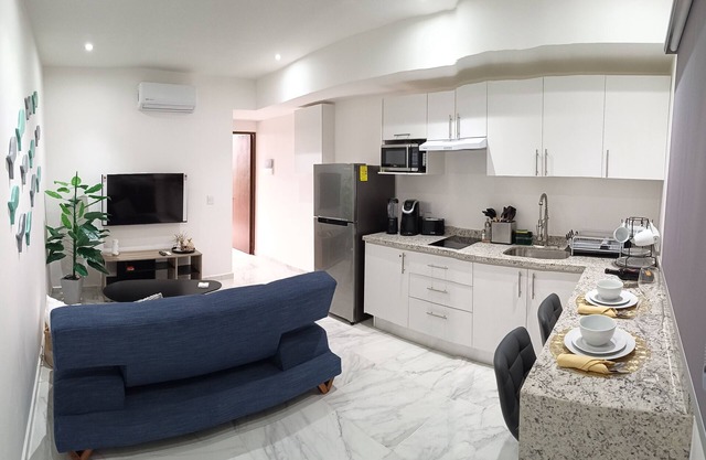 Modern vacation apartment with gym, jacuzzi, rooftop pool and sauna.