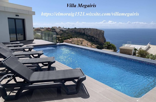 Modern villa with private access with private pool offering nice sea view