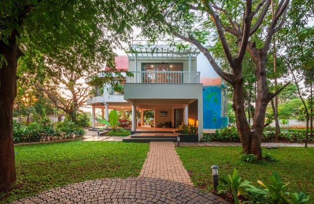 Morning Dew Retreat by StayVista - Modern interiors, Indoor games, Lush greenery, Pool & Gazebo await your escape