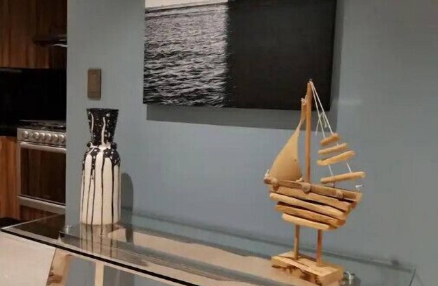 Nautical Apartment's Embrace: Dive into Seaside Now Moments
