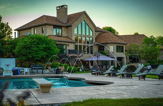 NEW LISTING! Mansion on the Lake (8-Bedroom Home) with Pool by RedAwning