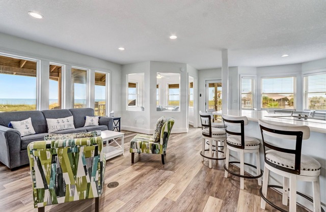 New Listing! Stunning Oceanfront 4-bedroom 3 bath house nestled on the quiet end of the island.