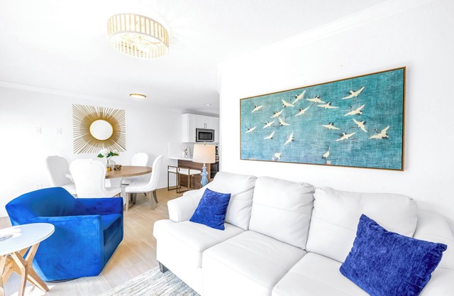 NEW LISTING! Village Breeze - Heated Pool, Private Patio, Village and Beach!