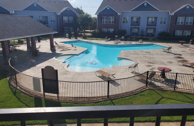 NEW LISTING! WALKING DISTANCE TO KYLE FIELD! AGGIE CONDO WITH POOL VIEWS