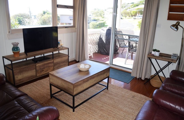 New Owners New Look for a very special beach cottage Seaspray.