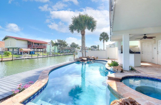 New Ownership - Canal-front home with pool, pool spa, kayaks, dock, & casita