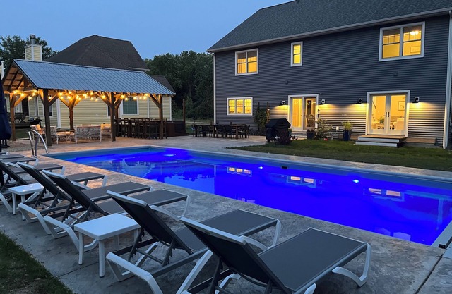 New South Haven Getaway with large 16 by 40 salt water inground pool and hot tub