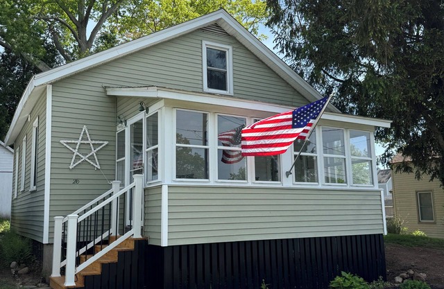 NEW this summer! Sunny beach house in Point O' Woods with stunning water views!