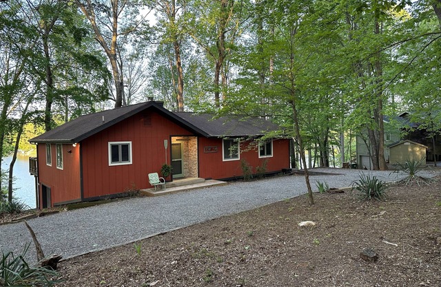Newly renovated! Lake front home with private beach and boat access.