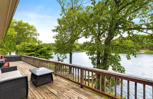 Newly renovated with boat dock just steps to the water and the trails!