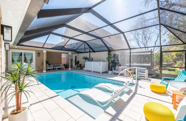 Not Your Average Pool Home At The Beach! Amenities Galore! Walk to the beach!
