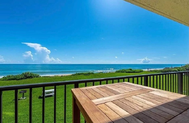 Oceanfront condo steps from quiet no drive beach