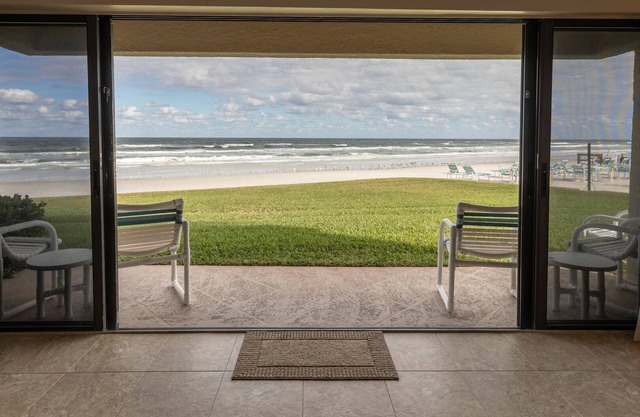 Oceanfront Ground-Floor Retreat on No-Drive Beach | Peace & Comfort