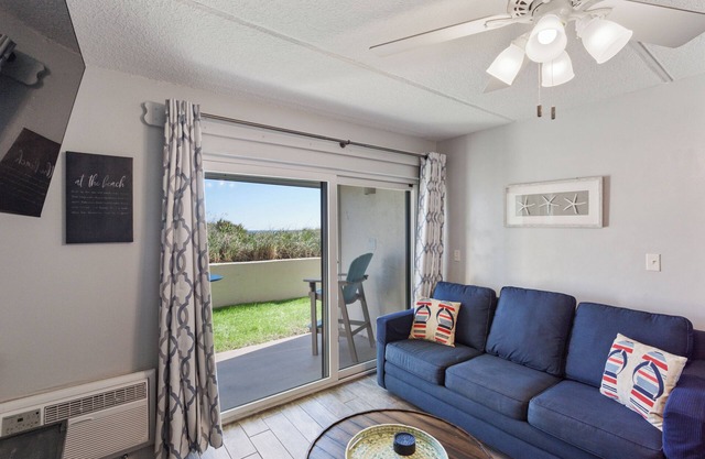 Oceanfront Patio Suite with daily housekeeping and welcoming front desk staff