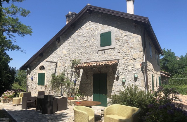 Old country house nestled in the green hills of Bologna