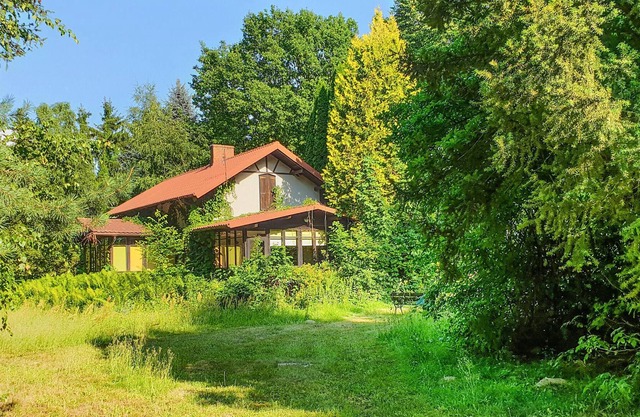 On a natural property this charming vacation home near the Vistula welcomes you.
