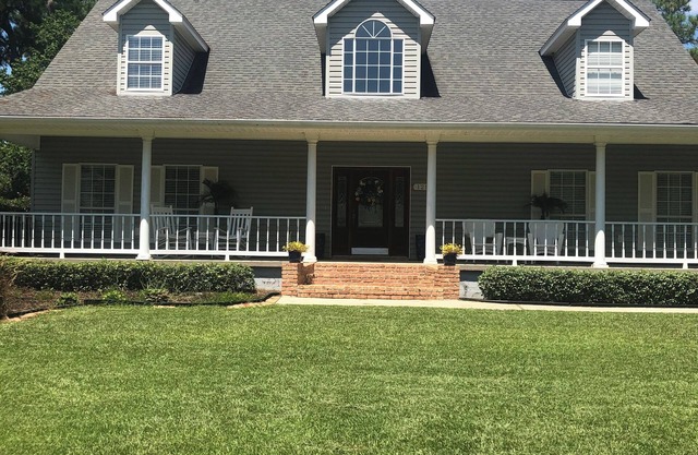 On the Pass Christian Golf Course and minutes from the beaches! 4 beds 3 baths.