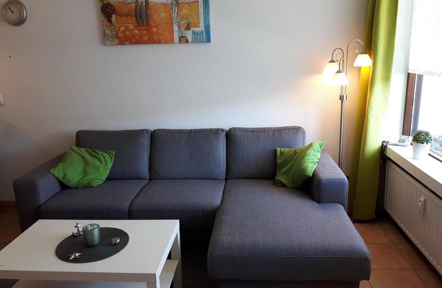 only 100 m to the beach bright and friendly apartment, balcony with side sea view