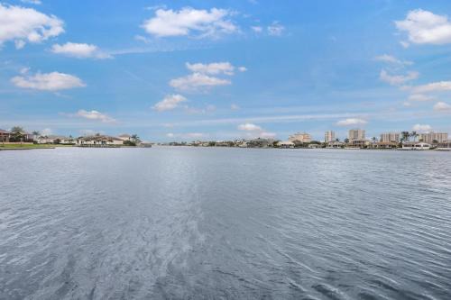 Opulent home with vast water view, pool and hot tub