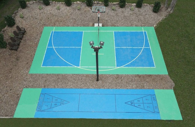Outdoor Oasis with pickleball, swimming pond, basketball, shuffleboard & pavilion with kitchen